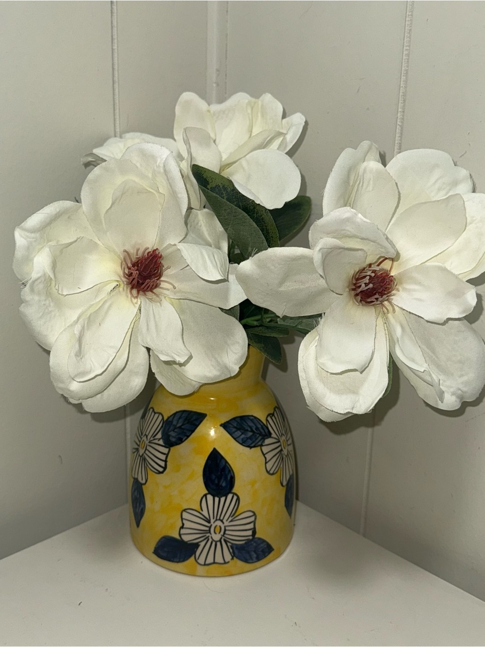 White Magnolia Stems in Yellow Floral Ceramic Vase